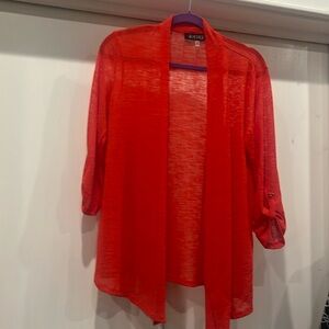 Red-orange sheer sweater